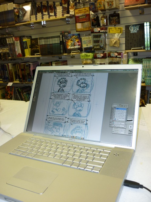 Erik's laptop with a panel from his new comic --work in progress.